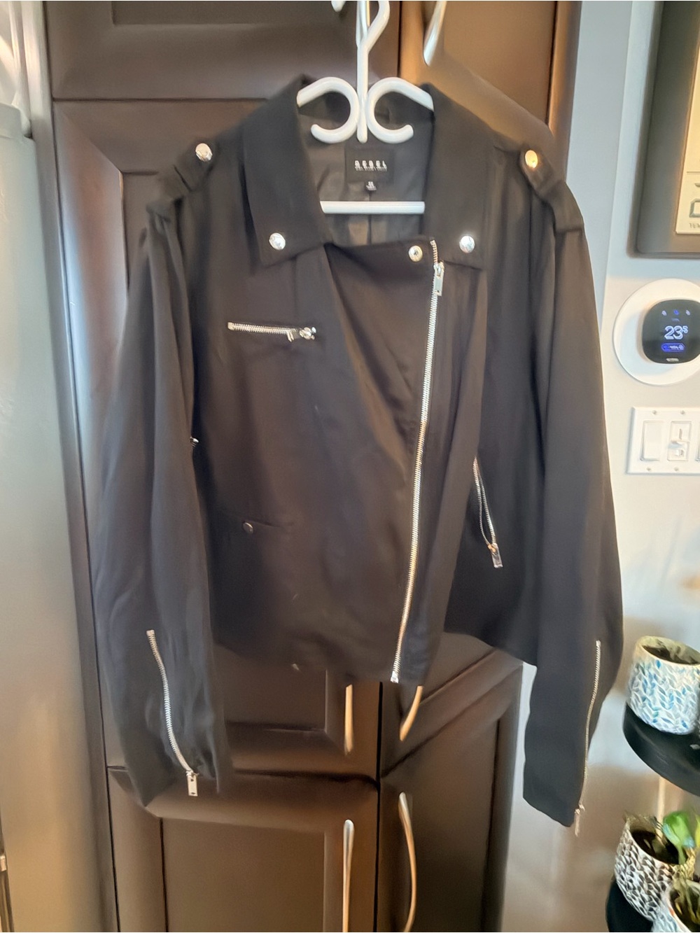 rebels Black Jacket with White Hanger Accent